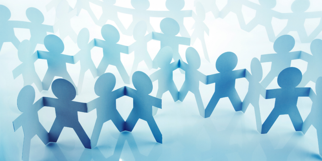 A group of paper cut-outs in blue intertwined.