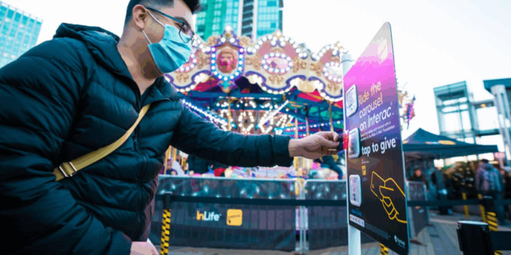 tiptap machine being utilized by a masked individual.